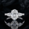 Exquisite Oval & Pear Three-Stone Diamond Engagement Ring in 18K White Gold