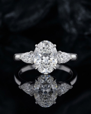 Exquisite Oval & Pear Three-Stone Diamond Engagement Ring in 18K White Gold