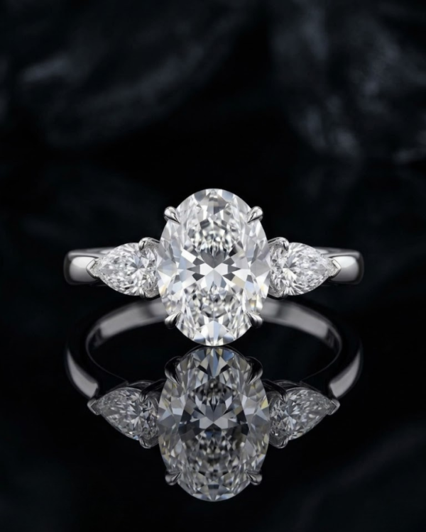100 Exquisite Oval & Pear Three-Stone Diamond Engagement Ring in 18K White Gold