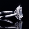 86 18K White Gold Emerald Cut Diamond Halo Engagement Ring | Architectural Art Deco Style